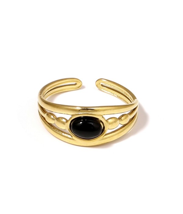 Anillo dorado con relieves ovalados y piedra...
