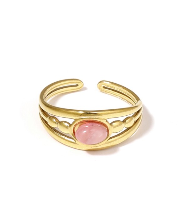 Anillo dorado con relieves ovalados y piedra...