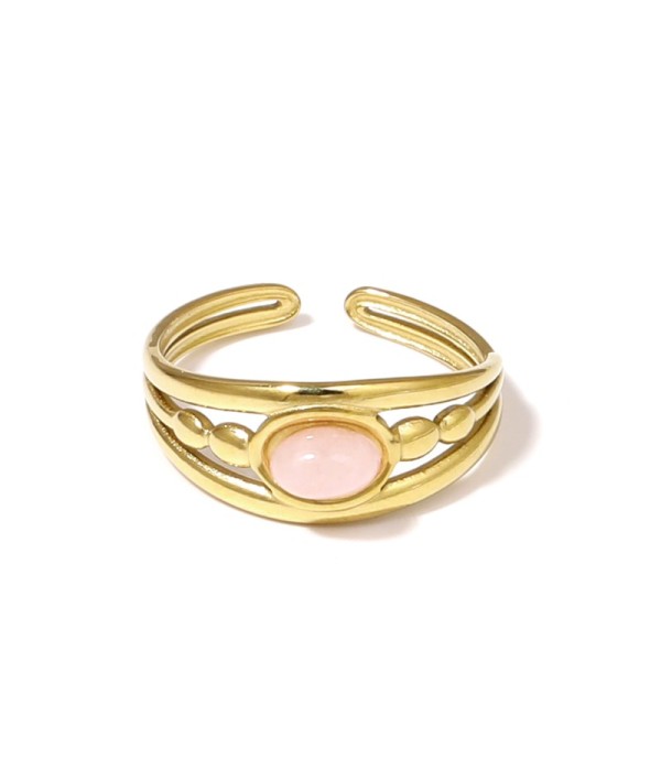 Anillo dorado con relieves ovalados y piedra...