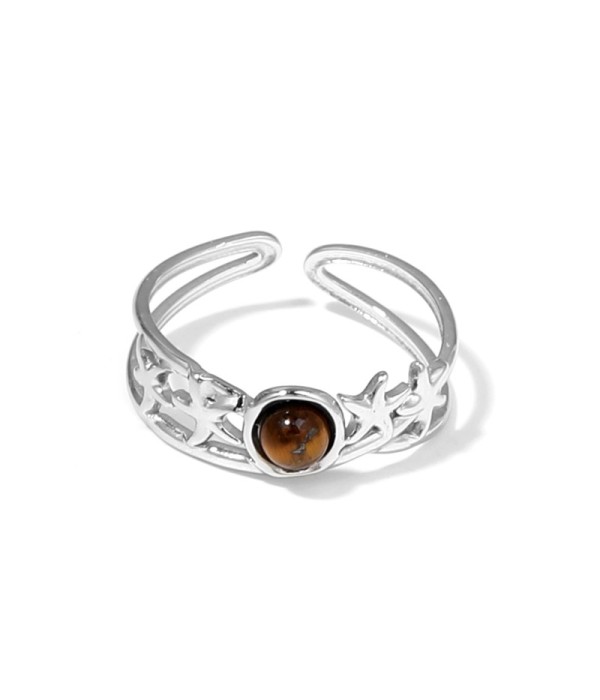 Anillo plateado con estrellas de mar y piedra