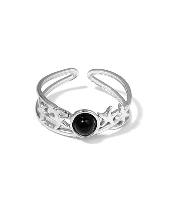 Anillo plateado con estrellas de mar y piedra