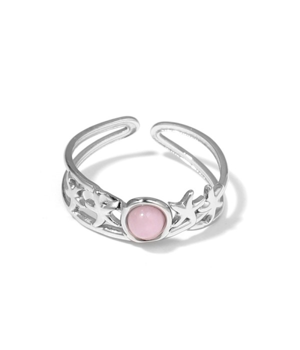 Anillo plateado con estrellas de mar y piedra