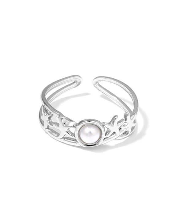 Anillo plateado con estrellas de mar y piedra