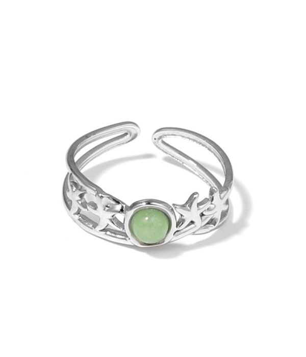Anillo plateado con estrellas de mar y piedra