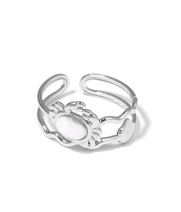 Anillo plateado con diseño de cangrejo, concha y piedra