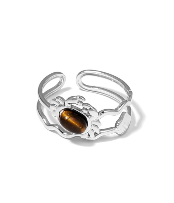 Anillo plateado con diseño de cangrejo, concha...