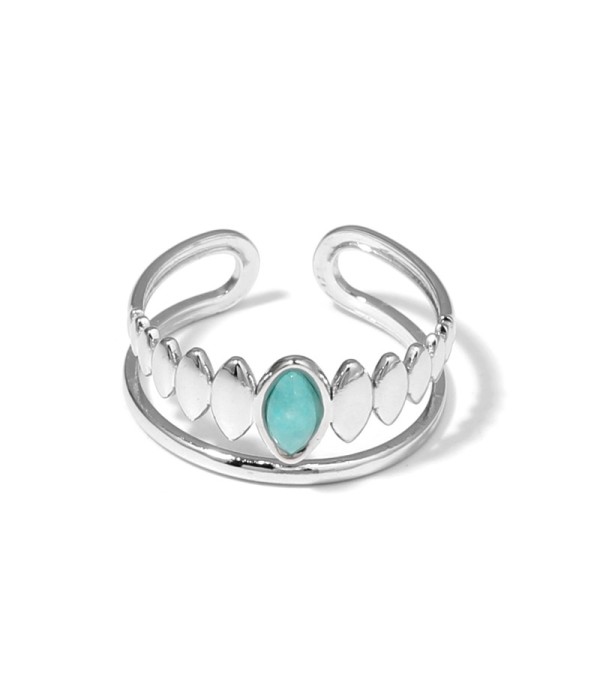 Anillo plateado con detalles ovalados y piedra...
