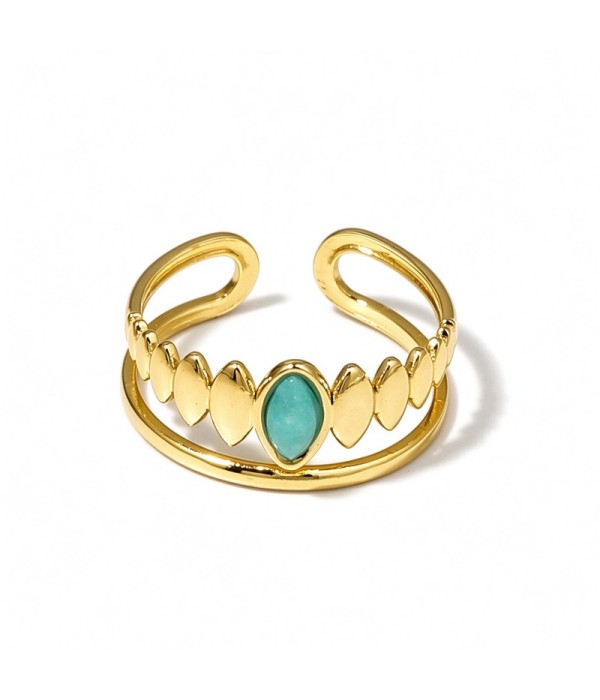 Anillo dorado con detalles ovalados y piedra...
