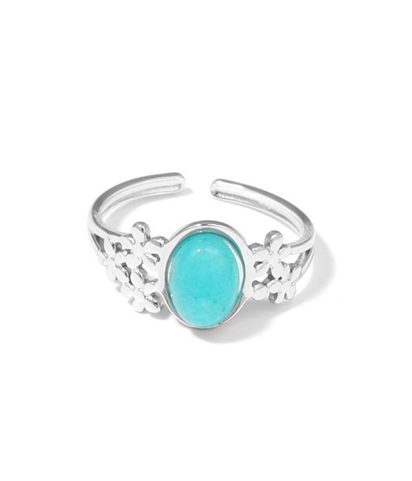 Anillo plateado con diseño de flores y piedra...