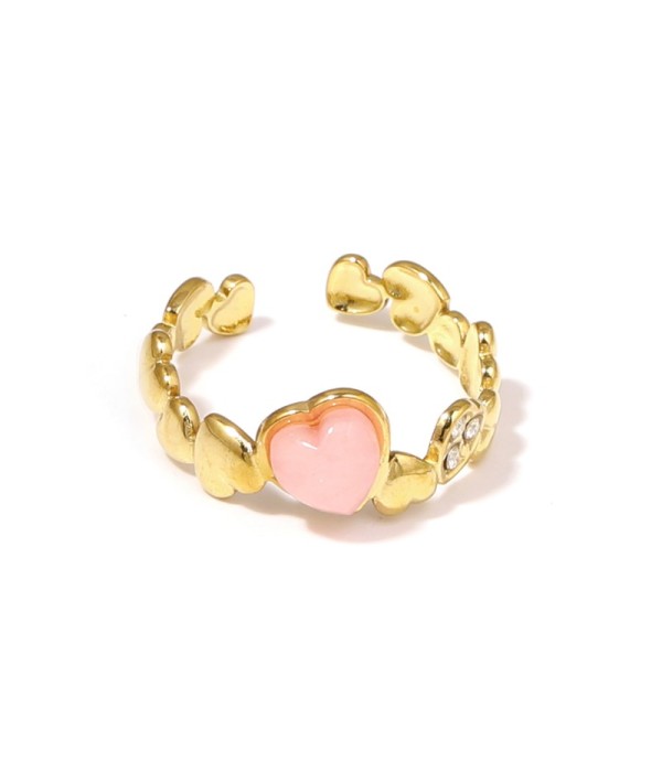 Anillo dorado con diseño de corazones, piedra y...