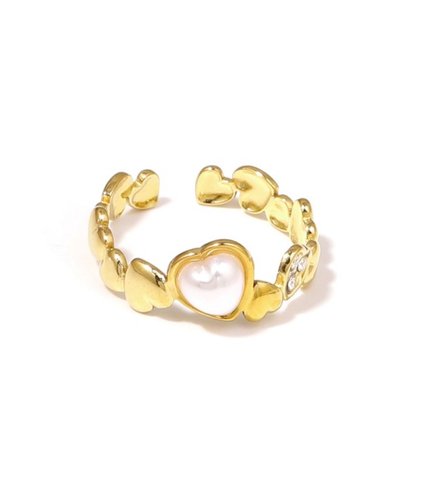 Anillo dorado con diseño de corazones, piedra y circonitas