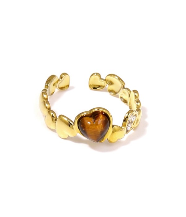 Anillo dorado con diseño de corazones, piedra y circonitas