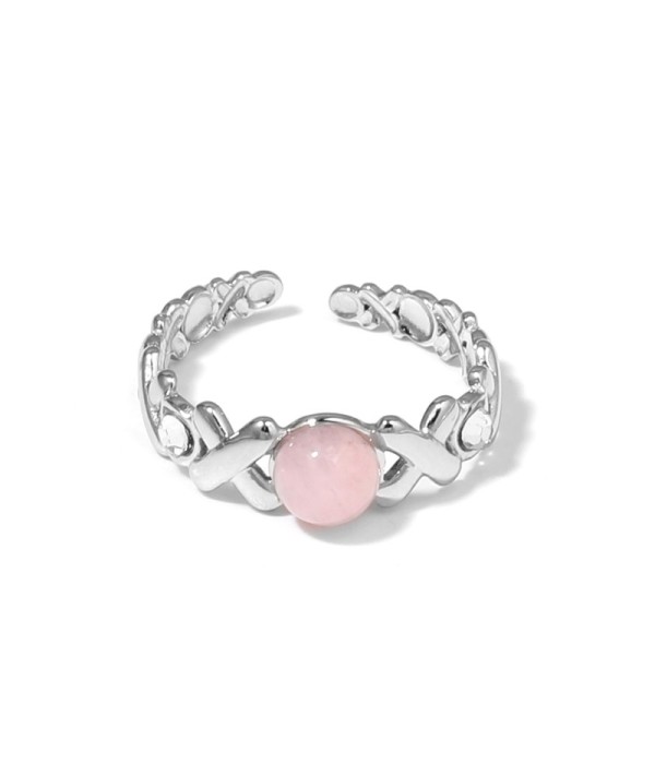Anillo plateado con diseño de cruces, piedra y circonitas