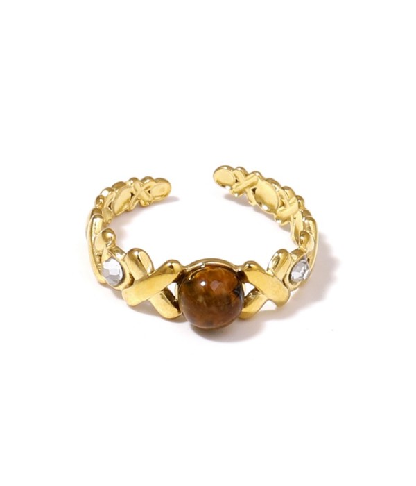 Anillo dorado con diseño de cruces, piedra y...