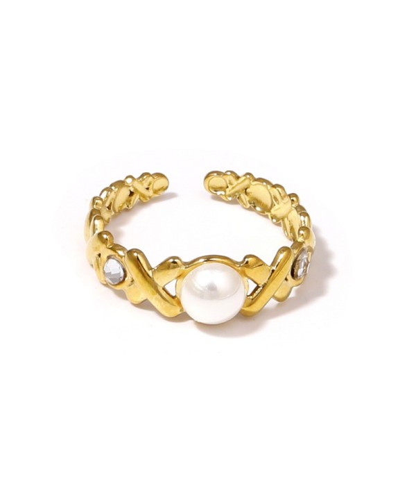 Anillo dorado con diseño de cruces, piedra y...