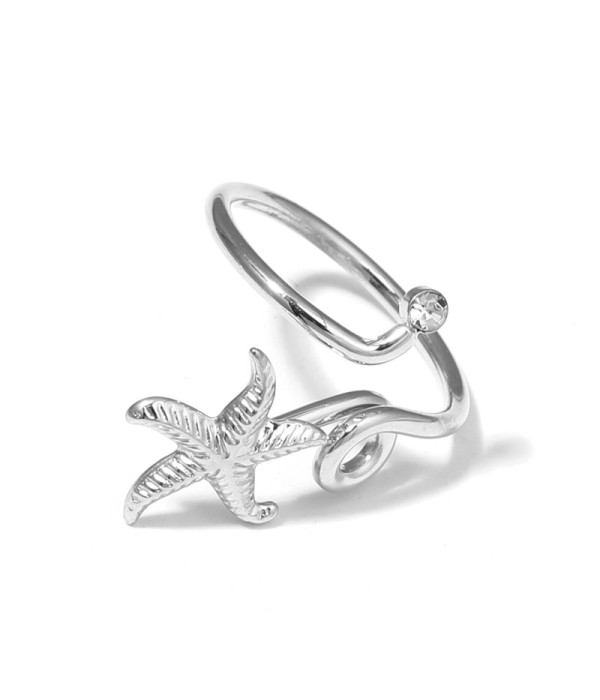 Anillo plateado con estrella de mar y circonita