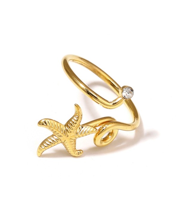 Anillo dorado con estrella de mar y circonita