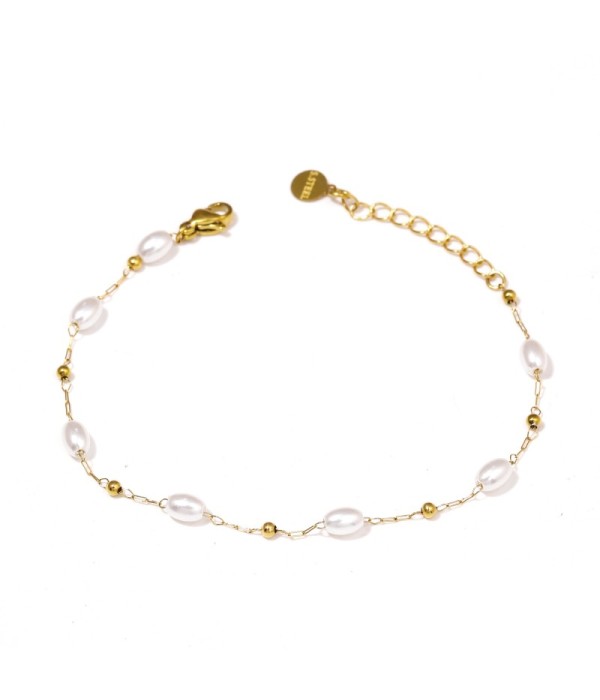 Pulsera dorada con perlas ovaladas y cuentas pequeñas
