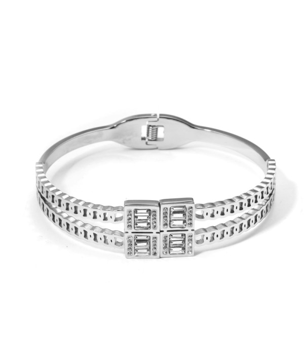 Pulsera rígida plateada con cristales tipo baguette