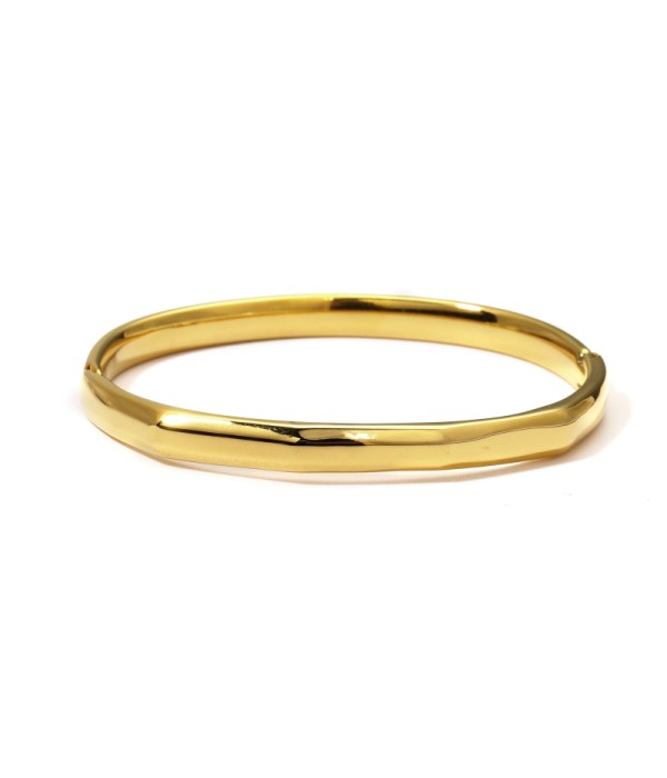 Pulsera rígida dorada tipo manguito