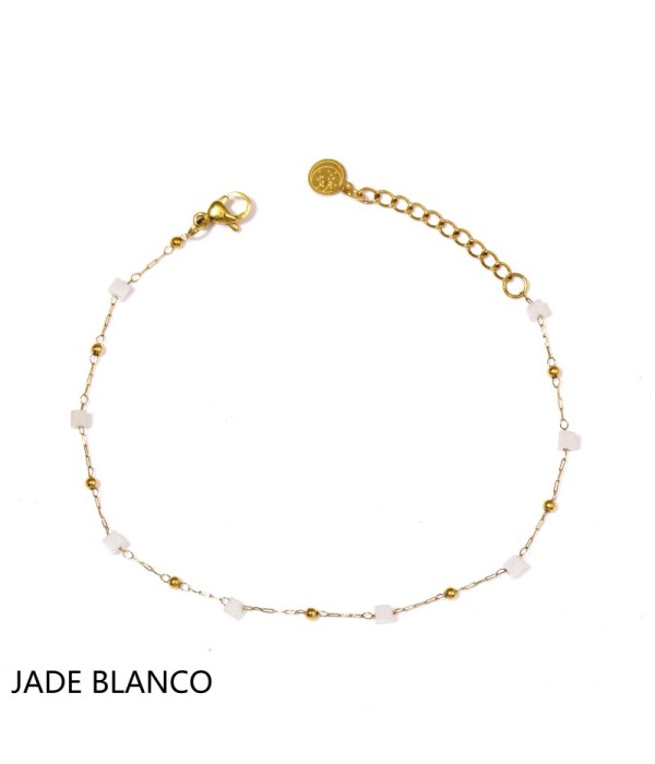 Pulsera dorada con piedras cuadradas y pequeñas...