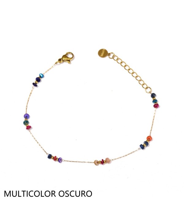 Pulsera dorada con cuentas planas y pequeñas...