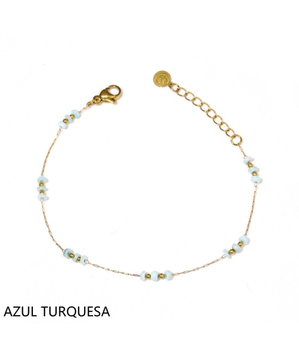 Pulsera dorada con cuentas planas y pequeñas cuentas