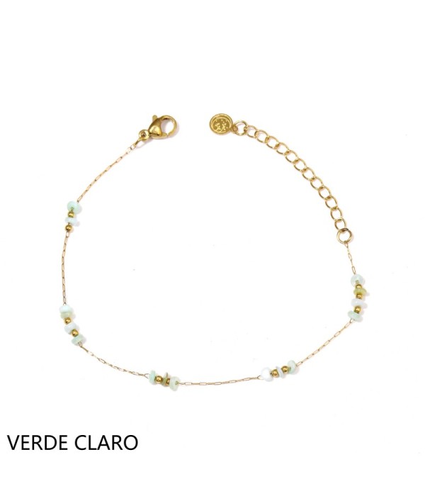 Pulsera dorada con cuentas planas y pequeñas...