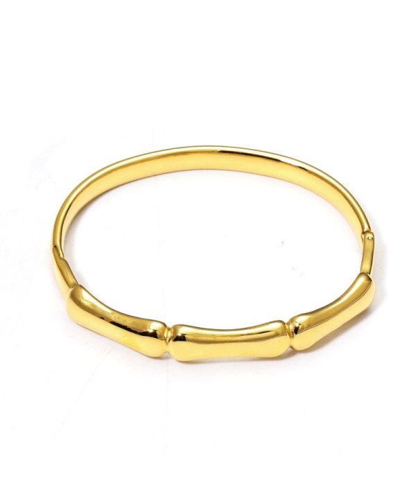 Pulsera rígida dorada tipo manguito