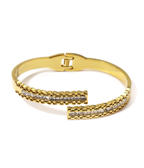 Pulsera rígida dorada con bandas alternadas detalladas...