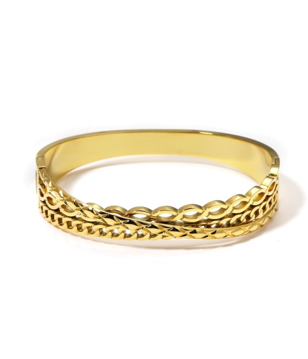 Pulsera rígida dorada con bandas entrecruzadas