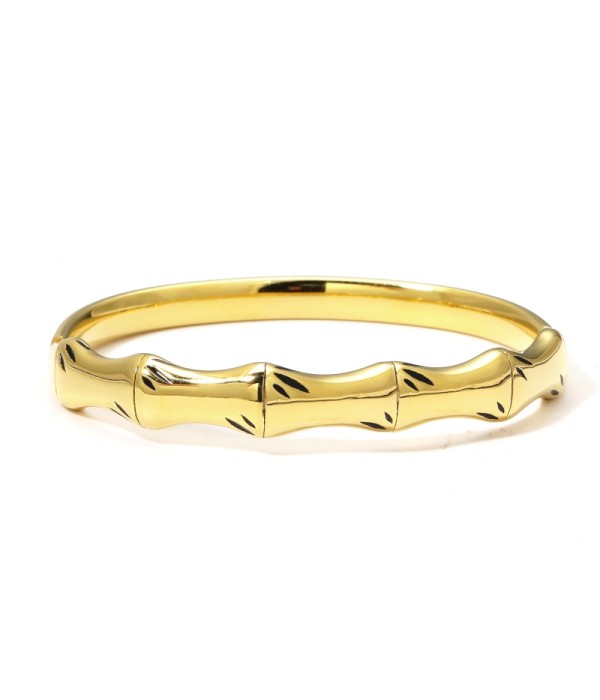 Pulsera rígida dorada tipo manguito