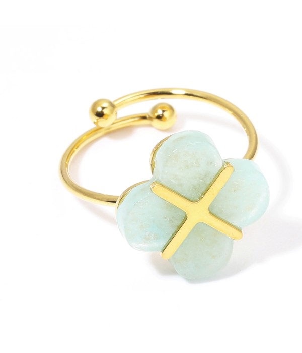 Anillos dorados con trébol de cuatro hojas multicolores