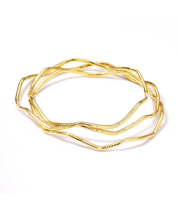 Pulsera rígida dorada ondulada texturizada