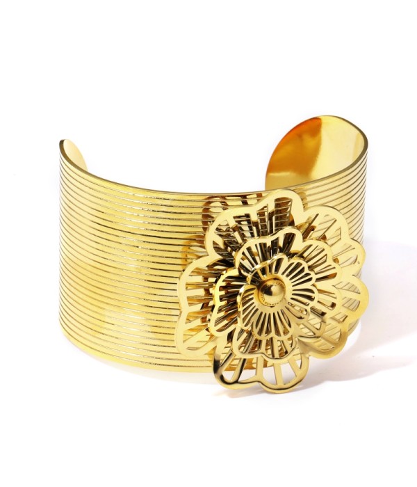 Brazalete dorado con flor