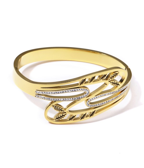 Pulsera rígida dorada calada de hojas