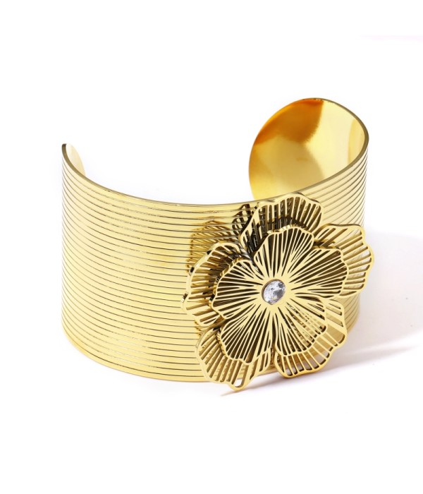 Brazalete dorado con flor
