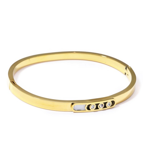 Pulsera rígida dorada tipo manguito