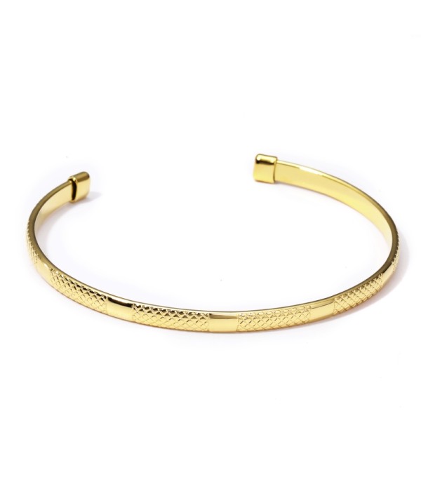 Pulsera rígida dorada abierta patronada