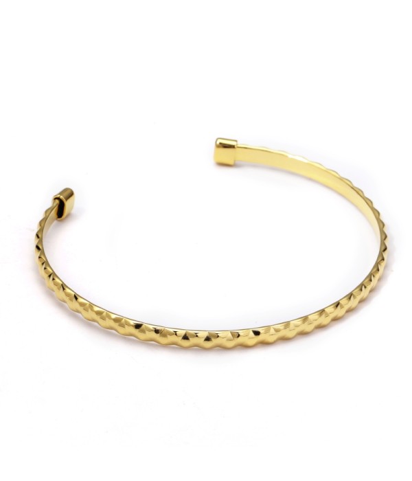 Pulsera rígida dorada abierta texturizada geométrica