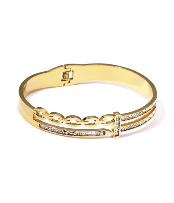 Pulsera rígida dorada con circonitas