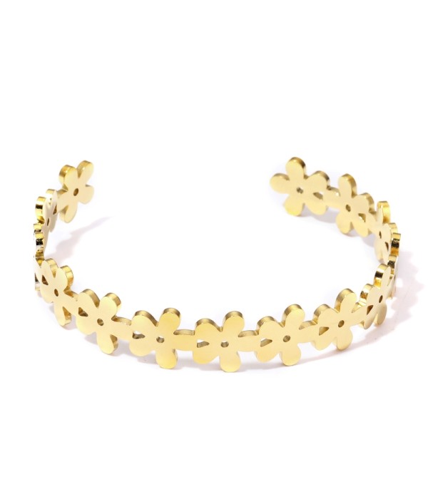 Pulsera rígida dorada de aros de flores