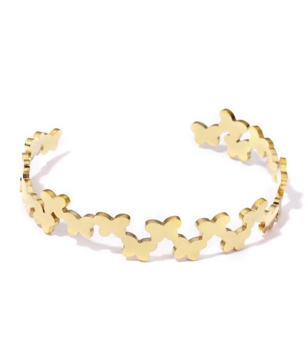 Pulsera rígida dorada de aros de mariposa