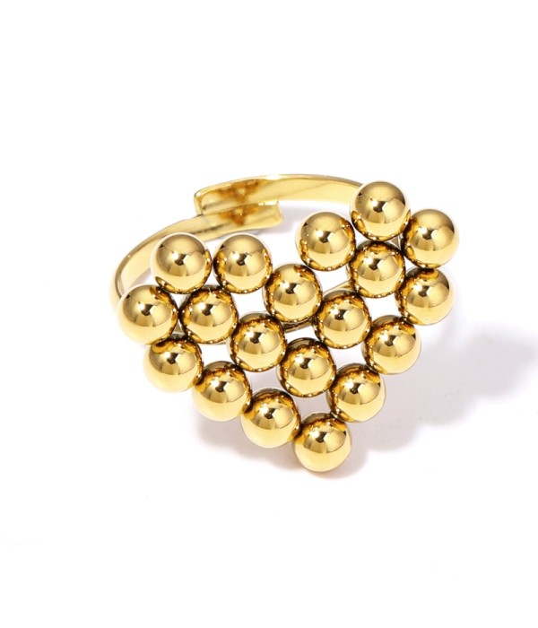 Anillo dorado abierto de corazón formando por esferas