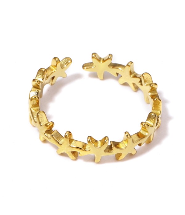 Anillo dorado de aros de estrellas del mar