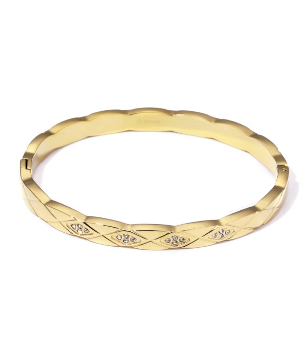 Pulsera rígida dorada tipo manguito con borde ondulado