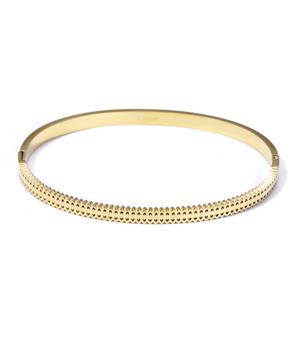 Pulsera rígida dorada tipo manguito con borde dentado