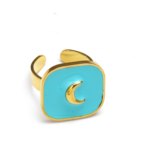 Anillos dorados con pieza de colores en centro