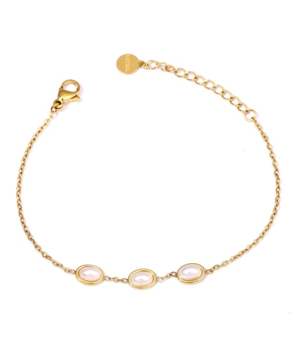 Pulsera dorada con perla ovalada