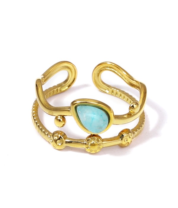 Anillo dorado con piedras